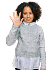 Young little girl with afro hair wearing casual clothes showing and pointing up with fingers number...