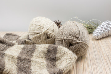 Cozy knitted socks and skeins.