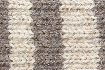 Cozy knitted socks and skeins. Close-up.