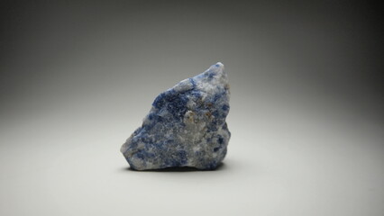 Rare natural Fluorescent Afghanite in display