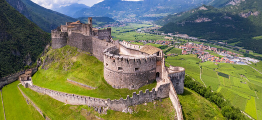 Castel Beseno aerial drone panoramic view - Most famous and impressive historical medieval castles of Italy in Trento province, Trentino region - 622824396