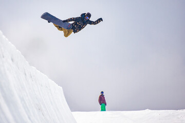 Snowboarder on a slope in the alps