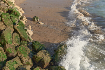 waves crashing on rocks