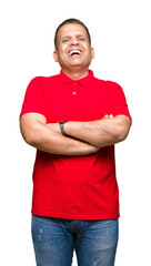 Middle age arab man over isolated background happy face smiling with crossed arms looking at the camera. Positive person.