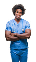 Afro american surgeon doctor man over isolated background happy face smiling with crossed arms looking at the camera. Positive person. - obrazy, fototapety, plakaty