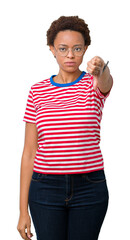 Beautiful young african american woman wearing glasses over isolated background looking unhappy and angry showing rejection and negative with thumbs down gesture. Bad expression.