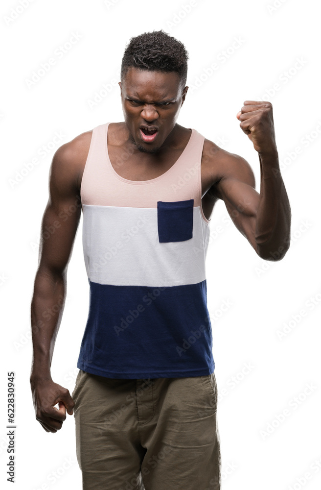 Canvas Prints Young african american man annoyed and frustrated shouting with anger, crazy and yelling with raised hand, anger concept