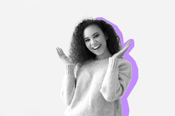 Portrait of happy African-American woman on light background