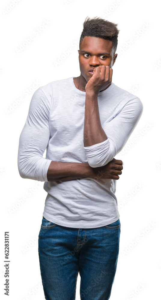 Sticker Young african american man over isolated background looking stressed and nervous with hands on mouth biting nails. Anxiety problem.