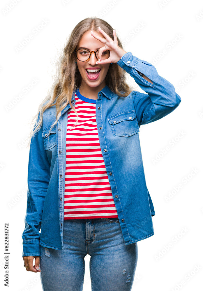 Sticker beautiful young blonde woman wearing glasses over isolated background doing ok gesture with hand smi