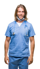 Young handsome doctor man with long hair over isolated background winking looking at the camera with sexy expression, cheerful and happy face.