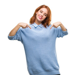 Young beautiful woman over isolated background wearing winter sweater looking confident with smile on face, pointing oneself with fingers proud and happy.