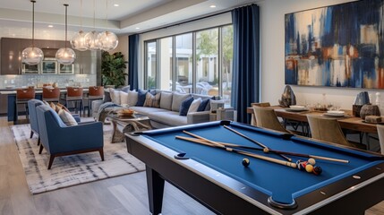 Game room with a pool table, a foosball table, and other entertaining options for residents to enjoy friendly competition and leisure activities