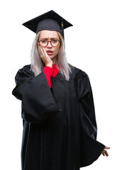 Young blonde woman wearing graduate uniform over isolated background touching mouth with hand with painful expression because of toothache or dental illness on teeth. Dentist concept.