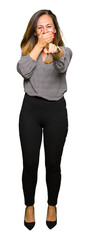 Beautiful middle age business woman Laughing of you, pointing to the camera with finger hand over mouth, shame expression