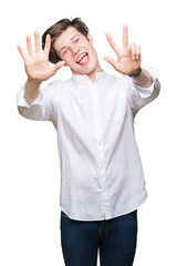Fototapeta na wymiar Young handsome business man over isolated background showing and pointing up with fingers number eight while smiling confident and happy.