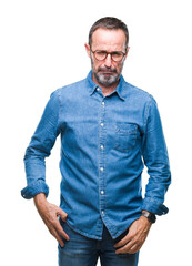 Middle age hoary senior man wearing glasses over isolated background depressed and worry for distress, crying angry and afraid. Sad expression.