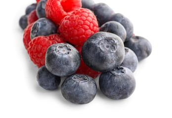 Ripe raspberry and blueberry on white background, closeup