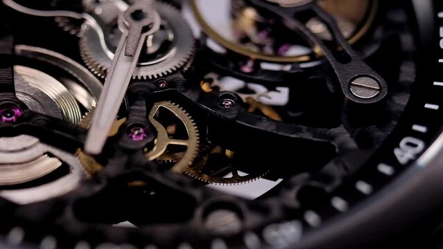 gear drive motion in skeleton watch. Mechanical watches with gears and cogs. Watch or clock mechanism. Clockwork details and parts. Inside watch, mechanical watch in macro view. Macro Shot Clock Face