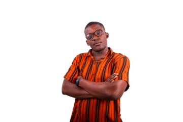 Portrait of a young thoughtful African boy with his arms folded and eyeglasses