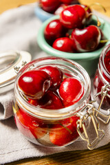 some ripe canned cherries in a clear