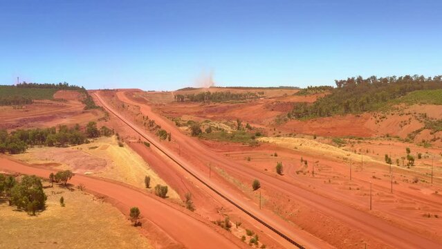 Bauxite mining in Western Australia, red bauxite mine, open-cut mining, shallow bauxite ore deposits, primary raw material for alumina and aluminium.
