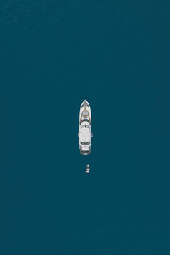 Aerial view of a yacht in Positano at night, Amalfi Coast, Italy.