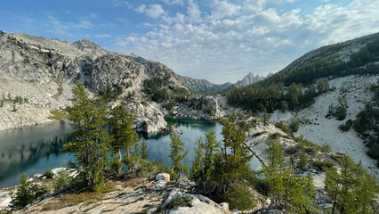 Alpine lake with a rugged mountain on the background