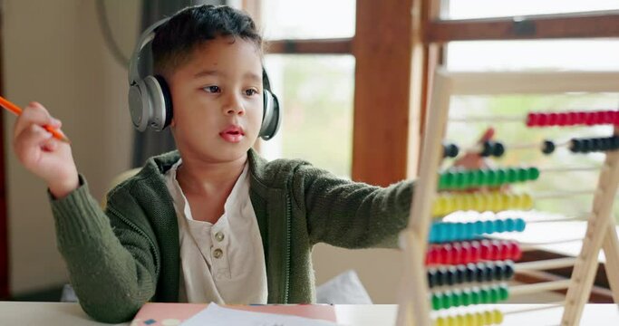 Abacus, math homework or child in kindergarten studying for knowledge, education or growth development. Alone, headphones or smart kid learning or counting on numbers to study for test in notebook
