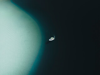 Aerial view of a boat that seems a satellite, Sicily, Italy.