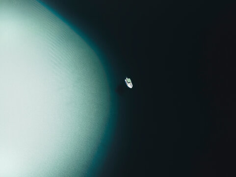 Aerial view of a boat that seems a satellite, Sicily, Italy.