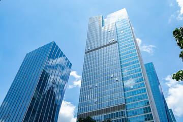 Obraz na płótnie Canvas commercial buildings under blue sky