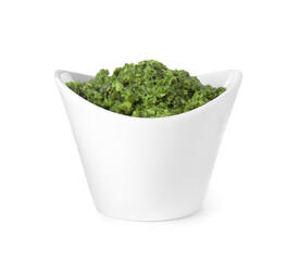 Delicious pesto sauce in bowl isolated on white