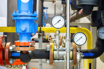 Boiler equipment. Mechanical pressure sensors on pipes. Industrial technologies. Fragment of boiler...