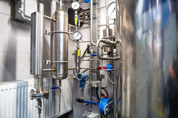 Gas distribution equipment. Steel tanks with pressure sensors. Gas distribution technologies. Methane supply equipment. Gas distribution system. Factory is supplied with propane. Energy resources