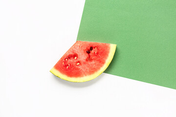 Piece of fresh watermelon on colorful background