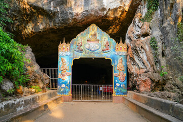 Entrance of the Wat Suwan Kuha (cave temple) in the Phang Nga province of Thailand