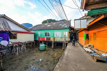 Houses on stilts in the floating fishing village of Koh Panyee, suspended over the waters of the...