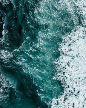 Aerial view of rough waves along the coastline in Reykjanesbaer, Southern Peninsula Region, Iceland.