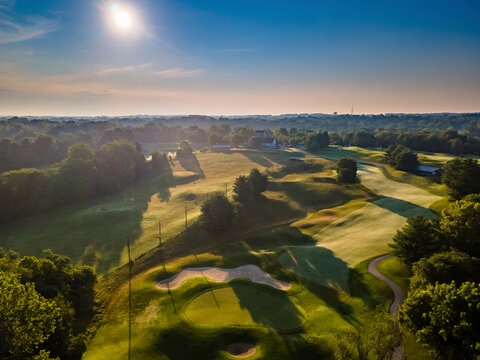 Aerial view of the sunrise over a golf course in Columbia, Maryland, United States.