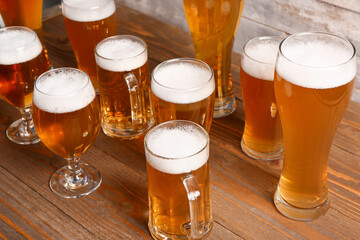 Glasses and mugs of cold beer on table. Oktoberfest celebration