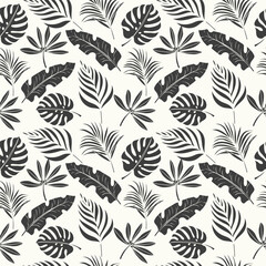 Seamless tropical pattern with monstera leaves and tropical leaves