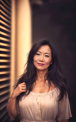 Fototapeta premium portrait photo of beautiful middle aged adult asian woman, generative AI