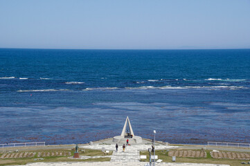 Fototapeta na wymiar 宗谷岬灯台から見た日本最北端の地の碑