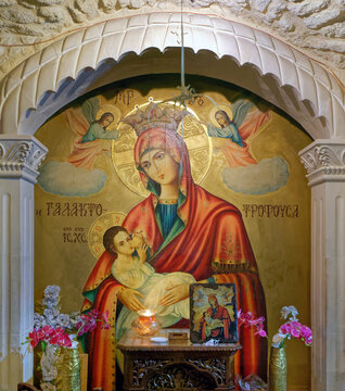 JERICHO, PALESTINE - JUNE 21,2023: The icon Virgin Mary suckling Jesus in Monastery of St Gerasimus in the Greek Orthodox monastery of Deir Hajla in the Jordan valley near Jericho, Israel  