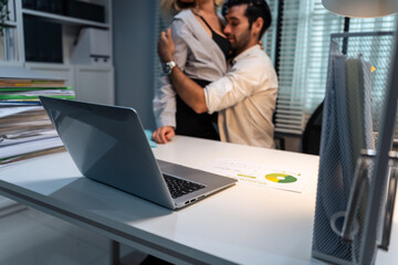 Caucasian businessman and woman foreplay and making love in the office. 