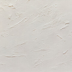 Fototapeta premium White rough filler plaster facade wall texture background.