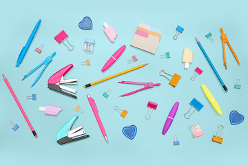Many different stationery on blue background