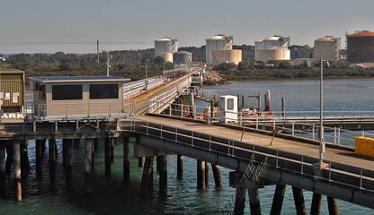 Fototapeta na wymiar Long Island Point refinery from jetty with tank farm at the rear