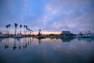 Fototapeta premium Sunrise pink sky over Channel Islands harbor in Port Hueneme on the gold coast of California United States